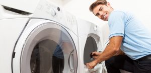 Dryer vent cleaning service technician performing clothes dryer inspection
